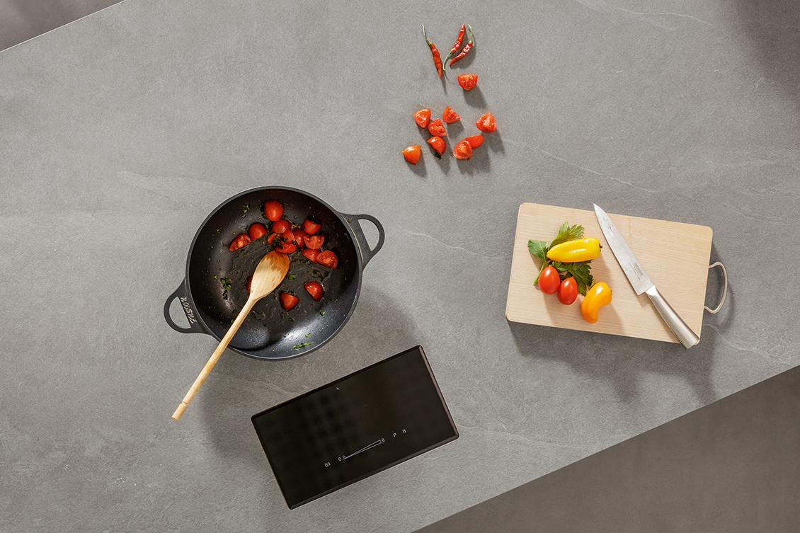 Invisible induction cooktop the latest kitchen countertop trend
